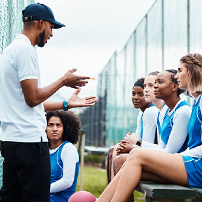 Netball plan, sports team and coach explain game strategy, teamwork collaboration talk or planning .